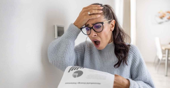 Woman is shocked from the rising energy costs