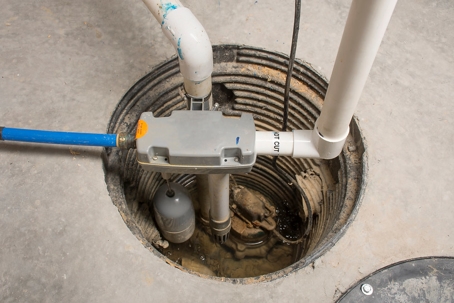 sump pump system installed in a sump pit